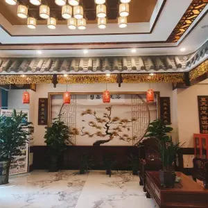 鑫一足浴（西鸿大厦店）的logo