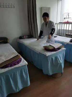 星康盲人按摩的logo