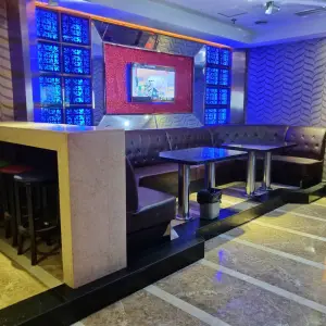 橙果ktv（陈家桥店）的logo