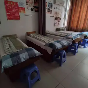 益康盲人按摩的logo