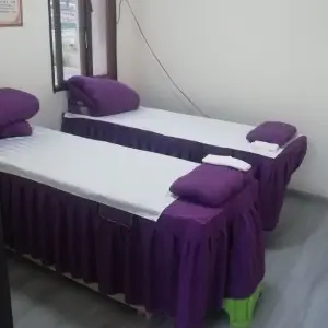 曙光盲人按摩的logo