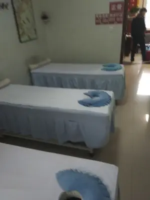 郑伟盲人推拿的logo