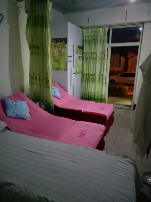 米易手道推拿中心的logo