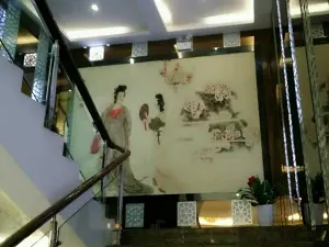 康情沐足的logo
